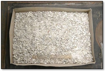 Figure 1 (A) – Sample Material at Nagrom, Australia, 24-036-02W, Nominal -12.7mm (A), 24-036-03W, -12.5/+6mm (B) (CNW Group/Power Metals Corp.)