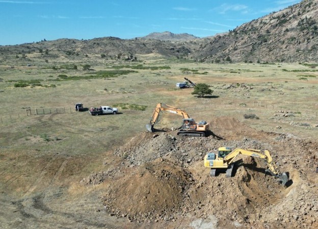 Figure 1 – Aerial view of excavating the blasted, weathered material at the CSM Test Mine